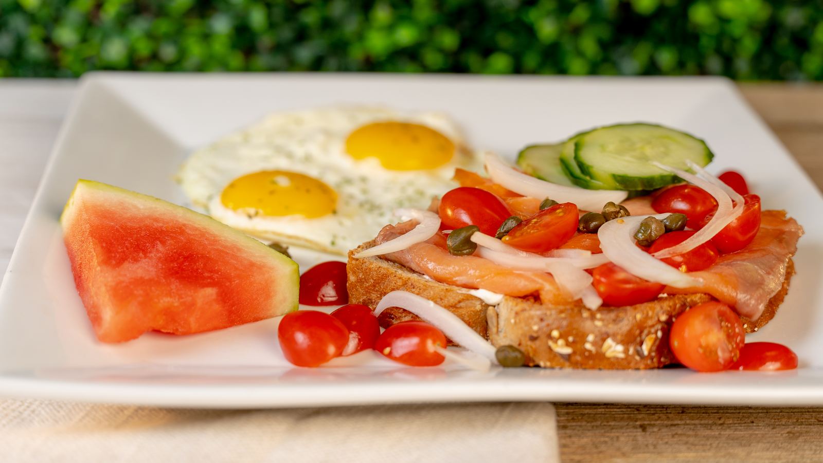 Smoked salmon toast with two eggs